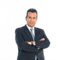 Carlos E. Troetsch